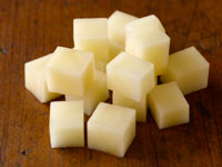 Photograph of cubed food.