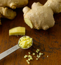 Photograph of whole and cut ginger.