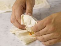 Photograph of folding phyllo dough over.